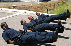 Police Officers Doing Crunches